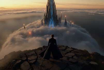 Lone Figure Stands Shattered Cliff