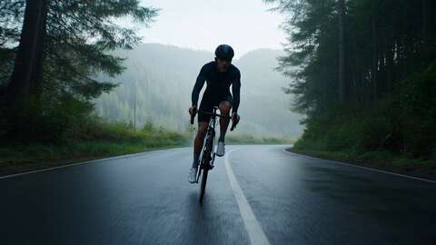 Cyclist Mountain Road - Grok Imagine