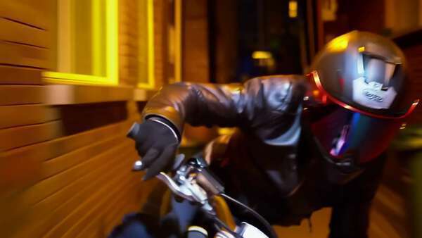 Biker Racing Narrow Alleys