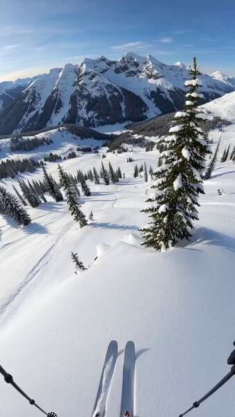 POV Skier Slaloming Down Mountain Slope