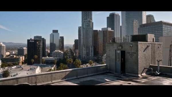 THE CITY IS HUNTING HER — Rooftop Combat