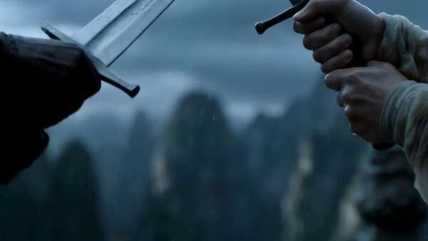 Sword Fight on Stone Bridge in Rain