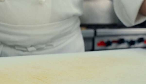 Chef Slicing Cartoon Onion
