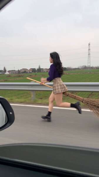 A Broomstick Passes the Car Window, Shot From Inside