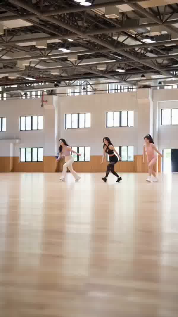 Triple Aerial Flip in Basketball Gym