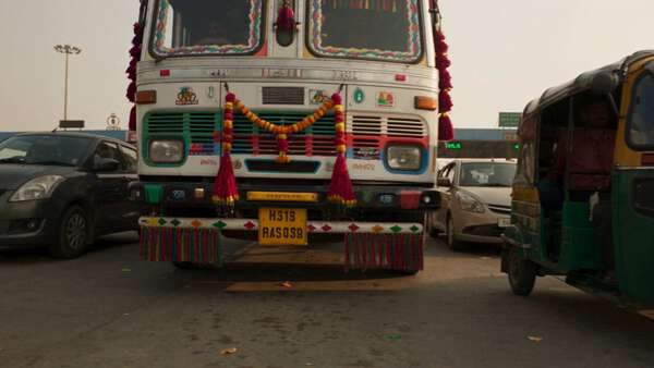 Flying Coupe At An Indian Toll Plaza